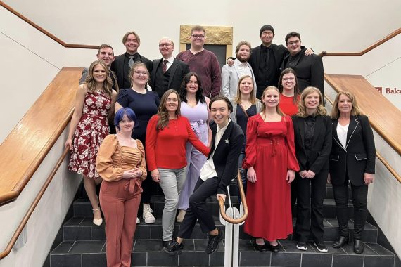 A group photo of 17 Bemidji State University music students and their accompanist.