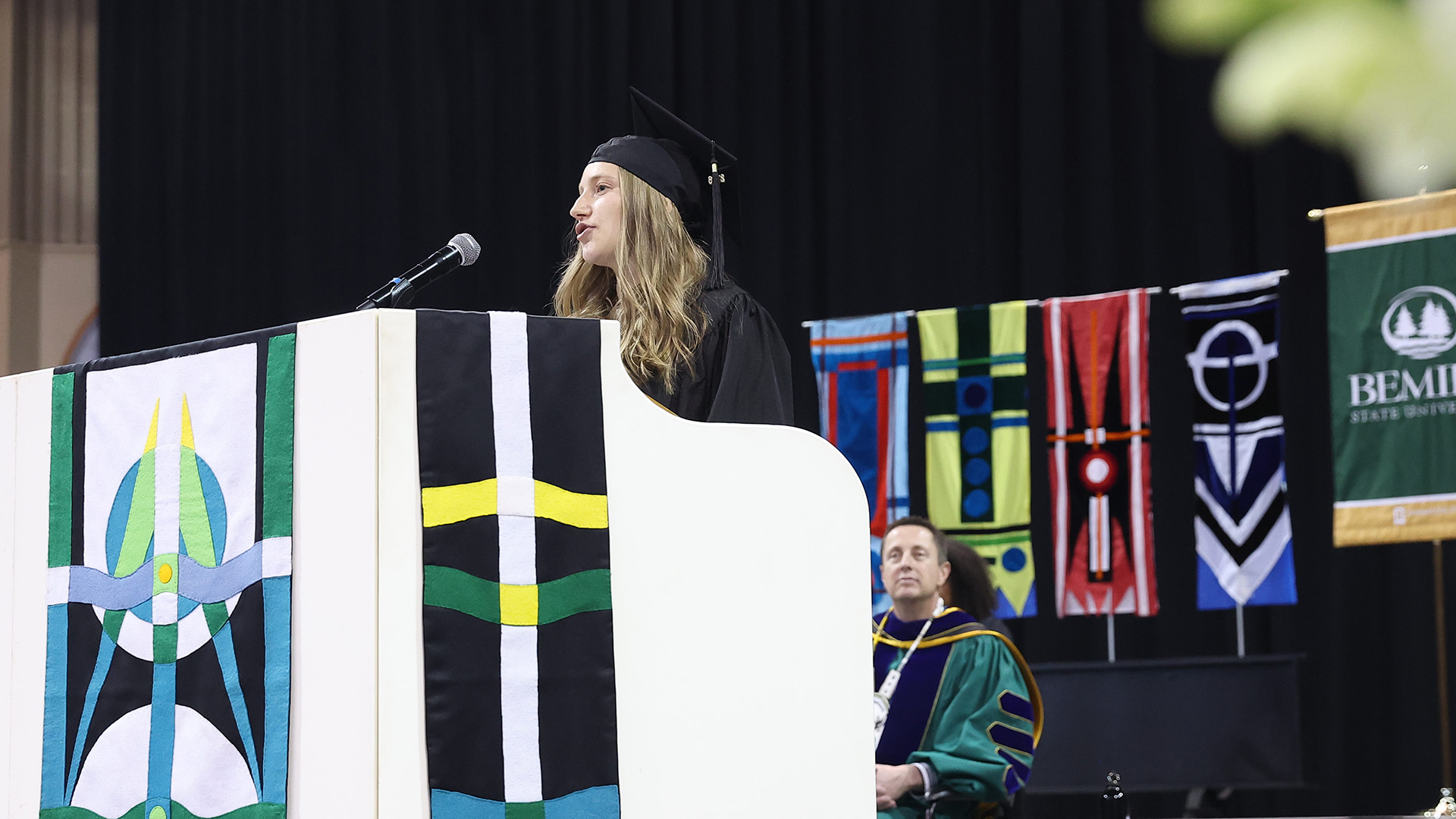 Elise Monson speaks to College of Sciences & Health graduates at BSU's 2026 Commencement ceremony.