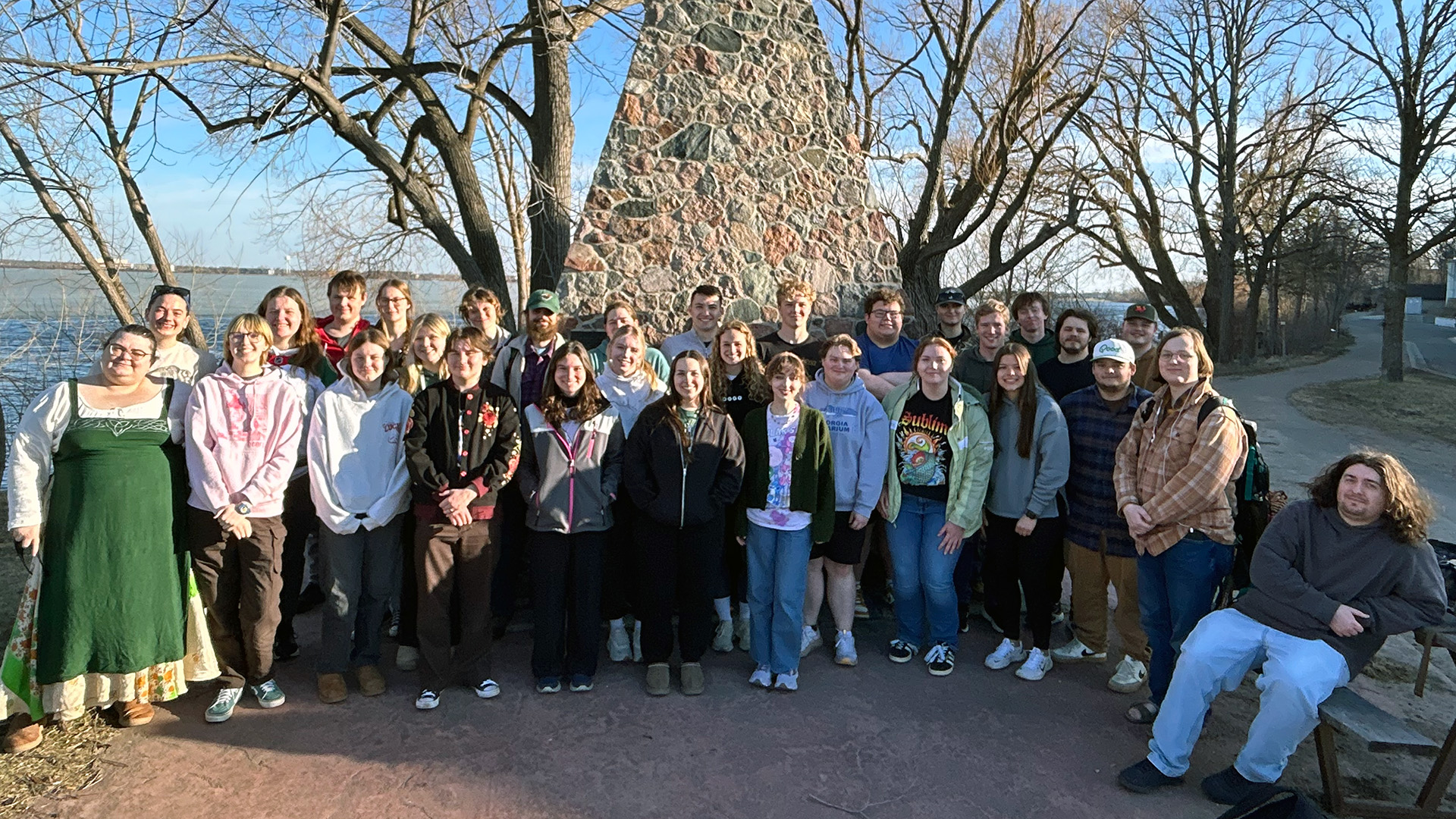 BSU's 2026-27 S-STEM scholars pose for a group photo in front of BSU's iconic outdoor lakeside fireplace.