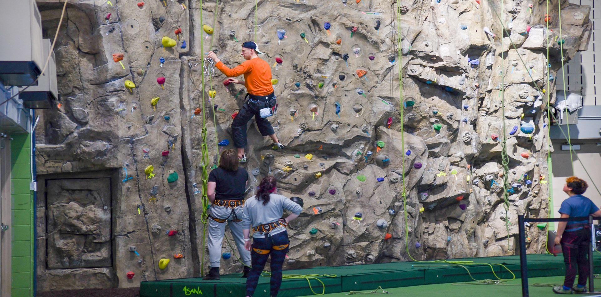 Student climbing the Rock wall