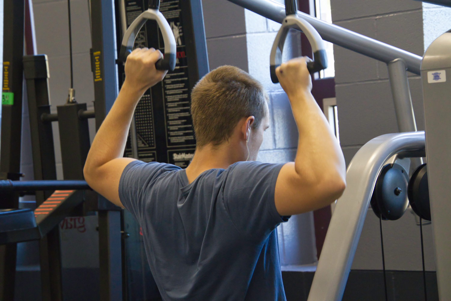 Student doing lateral pulldown