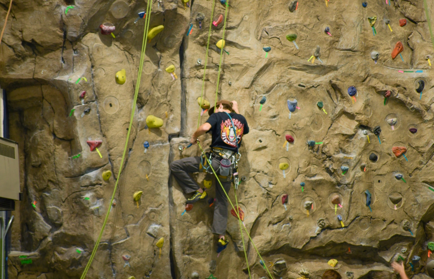 BSU student climbing a rock wall