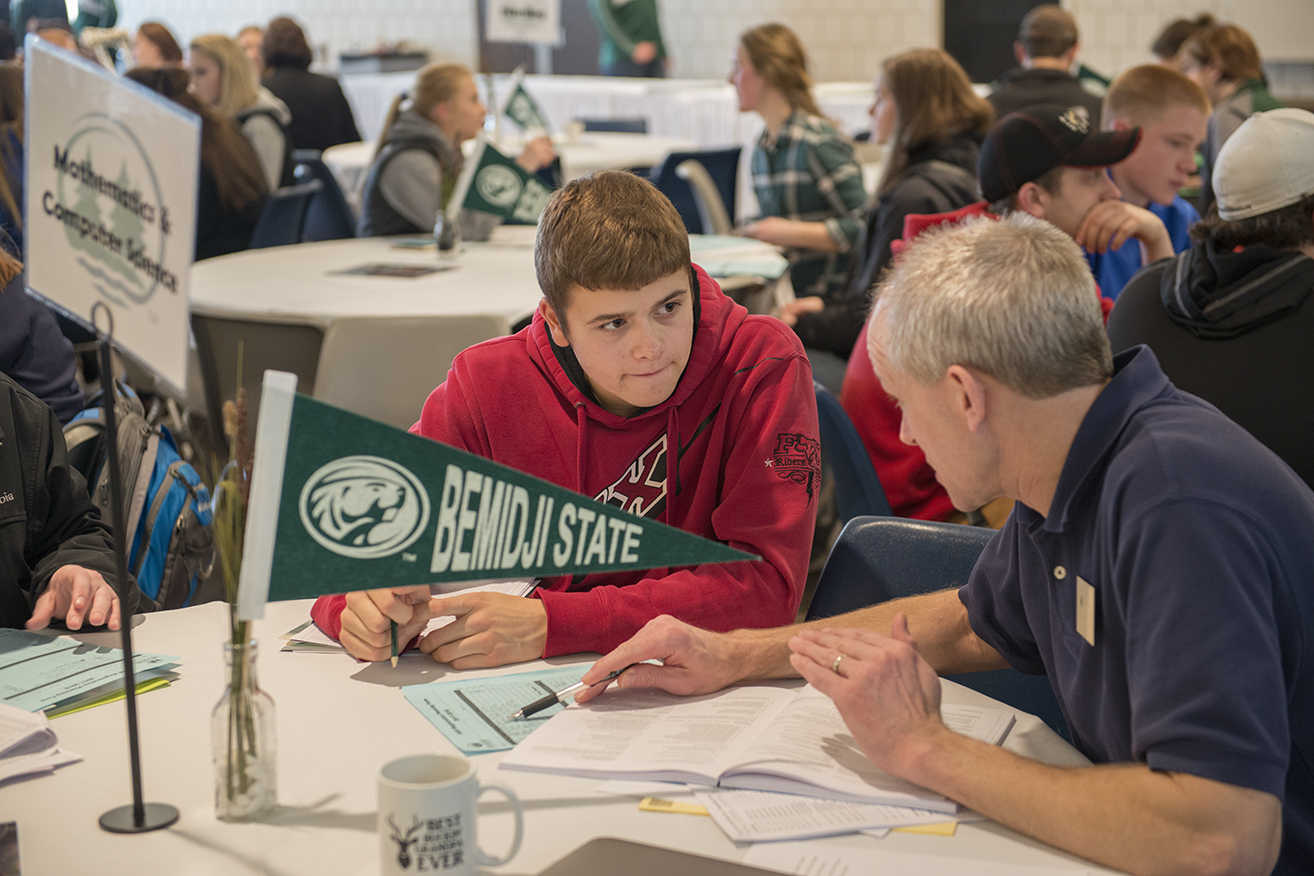 Bemidji State student being advised by Math and Computer Science faculty member