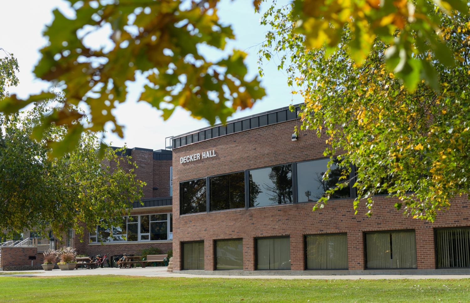 Decker Hall surrounded by fall foliage