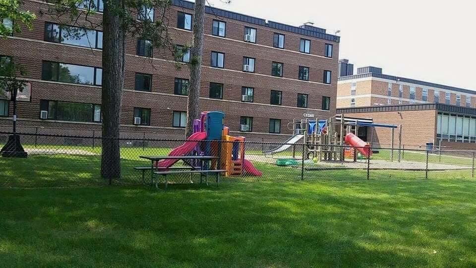 Exterior and playground of Cedar Hall