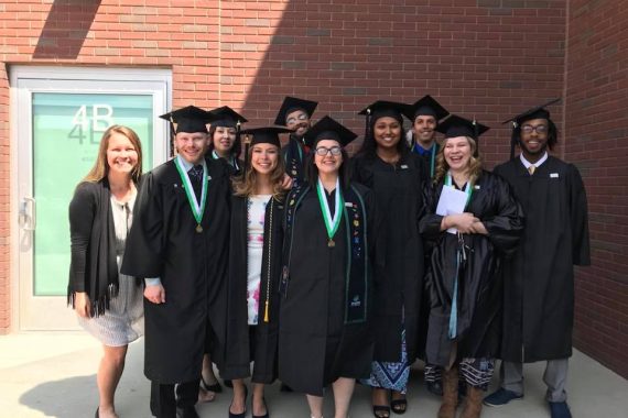 McNair scholars in graduation robes