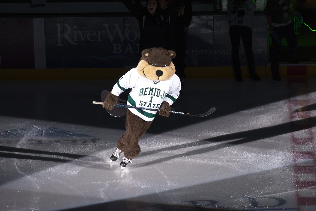 Bemidji State Beaver mascot skating on an illuminated rink