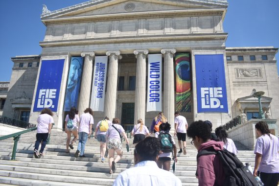 Upward Bound students walking up the steps to the Field Museum