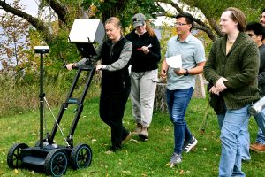 Students use BSU's Proceq GPR on the lakeshore behind campus.
