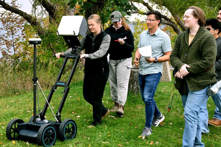 Students use BSU's Proceq GPR on the lakeshore behind campus.